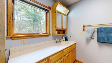 This 2-bedroom, 3-bathroom home is located in Country Club on Headwaters Country Club in Minnesota - for sale on GolfHomes.com, golf home, golf lot