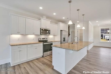 Experience timeless design and modern comfort in the Midland II on Green Hills Golf Course in North Carolina - for sale on GolfHomes.com, golf home, golf lot