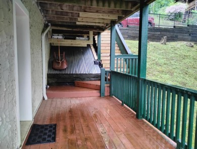 The most adorable, all wood, cabin with a magnificent view in on Sky Valley Resort and Country Club in Georgia - for sale on GolfHomes.com, golf home, golf lot