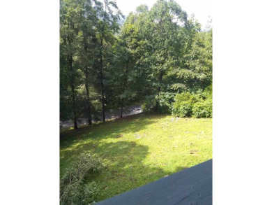 The most adorable, all wood, cabin with a magnificent view in on Sky Valley Resort and Country Club in Georgia - for sale on GolfHomes.com, golf home, golf lot