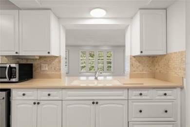 One or more photo(s) has been virtually staged. Carefree Florida on Mainlands Golf Club in Florida - for sale on GolfHomes.com, golf home, golf lot
