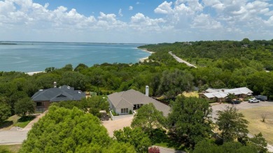 Captivating luxury home with stunning views of Lake Waco & on Ridgewood Country Club in Texas - for sale on GolfHomes.com, golf home, golf lot