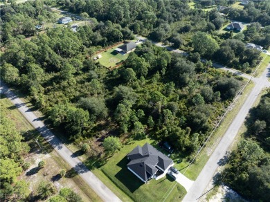 This 1/2 acre lot is located in a fast-growing side of Lehigh on Lehigh Resort Club in Florida - for sale on GolfHomes.com, golf home, golf lot