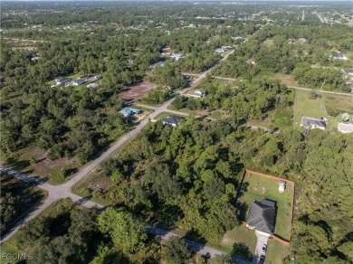This 1/2 acre lot is located in a fast-growing side of Lehigh on Lehigh Resort Club in Florida - for sale on GolfHomes.com, golf home, golf lot
