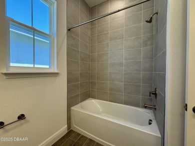 Welcome to the Flamingo Model Home by Jones Homes USA! This on LPGA International Golf Course in Florida - for sale on GolfHomes.com, golf home, golf lot