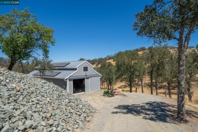 Just beyond the iron gates, you will find this amazing ranch on La Contenta Golf Course in California - for sale on GolfHomes.com, golf home, golf lot