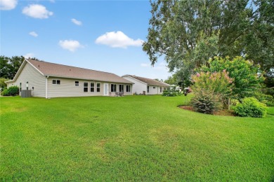 Welcome to this perfectly maintained 3-bedroom, 2-bathroom home on Plantation Golf Club in Florida - for sale on GolfHomes.com, golf home, golf lot