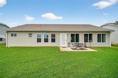 Welcome to this perfectly maintained 3-bedroom, 2-bathroom home on Plantation Golf Club in Florida - for sale on GolfHomes.com, golf home, golf lot