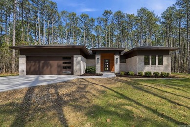 Discover the perfect blend of modern comfort, style, and relaxed on  in Arkansas - for sale on GolfHomes.com, golf home, golf lot