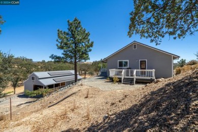 Just beyond the iron gates, you will find this amazing ranch on La Contenta Golf Course in California - for sale on GolfHomes.com, golf home, golf lot