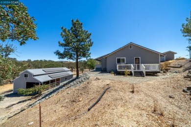 Just beyond the iron gates, you will find this amazing ranch on La Contenta Golf Course in California - for sale on GolfHomes.com, golf home, golf lot