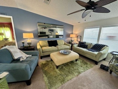 Nestled on a serene cul-de-sac overlooking the 6th Tee and lush on Four Lakes Golf Club in Florida - for sale on GolfHomes.com, golf home, golf lot