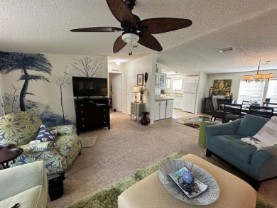 Nestled on a serene cul-de-sac overlooking the 6th Tee and lush on Four Lakes Golf Club in Florida - for sale on GolfHomes.com, golf home, golf lot