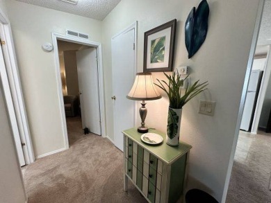 Nestled on a serene cul-de-sac overlooking the 6th Tee and lush on Four Lakes Golf Club in Florida - for sale on GolfHomes.com, golf home, golf lot
