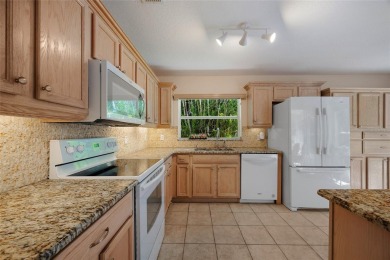 WELL-MAINTAINED 2 BEDROOM, 2 BATH PLUS DEN, 2-CAR GARAGE LOCATED on Kings Gate Golf Club in Florida - for sale on GolfHomes.com, golf home, golf lot