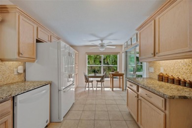WELL-MAINTAINED 2 BEDROOM, 2 BATH PLUS DEN, 2-CAR GARAGE LOCATED on Kings Gate Golf Club in Florida - for sale on GolfHomes.com, golf home, golf lot