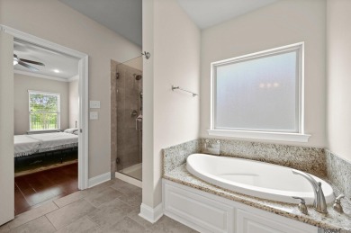 Welcome to 59685 Avery James Drive! This stunning 4-bedroom on The Island Country Club in Louisiana - for sale on GolfHomes.com, golf home, golf lot
