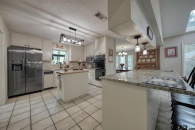 Welcome to your serene retreat in the beautiful, gated community on Hide-A-Way Lake Golf Course in Texas - for sale on GolfHomes.com, golf home, golf lot