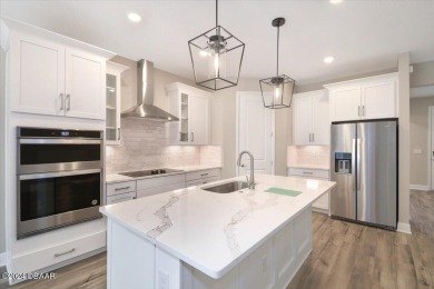 Brand new, energy-efficient home available by Dec 2023! Gourmet on LPGA International Golf Course in Florida - for sale on GolfHomes.com, golf home, golf lot