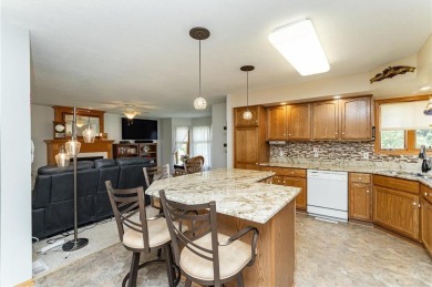 Ideally situated on a corner lot, this well-kept rambler offers on Dodge Country Club in Minnesota - for sale on GolfHomes.com, golf home, golf lot
