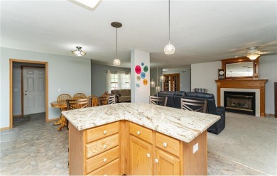 Ideally situated on a corner lot, this well-kept rambler offers on Dodge Country Club in Minnesota - for sale on GolfHomes.com, golf home, golf lot