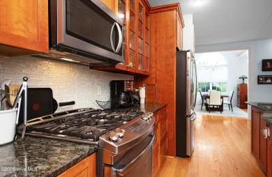 Every inch of this beautifully crafted home tells a story of on Harbour Point Golf Club in North Carolina - for sale on GolfHomes.com, golf home, golf lot