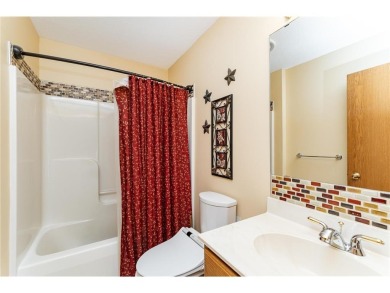 Ideally situated on a corner lot, this well-kept rambler offers on Dodge Country Club in Minnesota - for sale on GolfHomes.com, golf home, golf lot