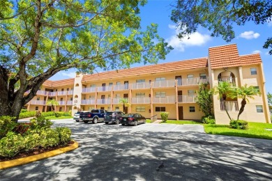 Bright and open 1/1 condo in Phase 3 of Sunrise Lakes community on Sunrise Lakes Phase III in Florida - for sale on GolfHomes.com, golf home, golf lot