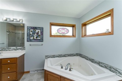 Ideally situated on a corner lot, this well-kept rambler offers on Dodge Country Club in Minnesota - for sale on GolfHomes.com, golf home, golf lot