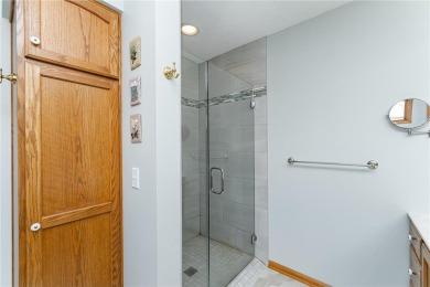 Ideally situated on a corner lot, this well-kept rambler offers on Dodge Country Club in Minnesota - for sale on GolfHomes.com, golf home, golf lot