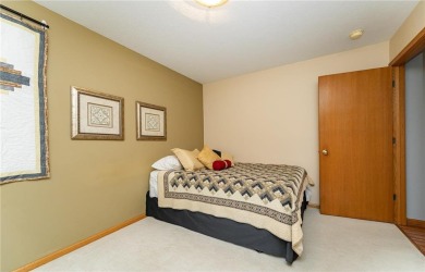 Ideally situated on a corner lot, this well-kept rambler offers on Dodge Country Club in Minnesota - for sale on GolfHomes.com, golf home, golf lot