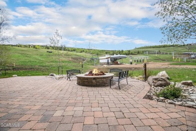 Gorgeous 2 bedroom 2 bath condo with views down the valley and on Headwaters Golf Course At Granby Ranch in Colorado - for sale on GolfHomes.com, golf home, golf lot