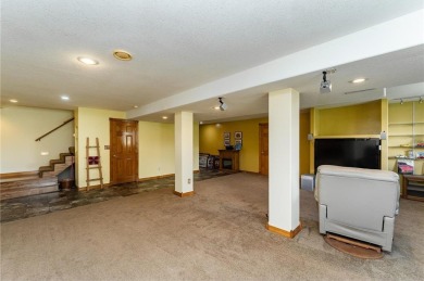 Ideally situated on a corner lot, this well-kept rambler offers on Dodge Country Club in Minnesota - for sale on GolfHomes.com, golf home, golf lot