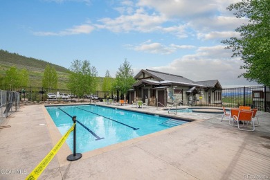 Gorgeous 2 bedroom 2 bath condo with views down the valley and on Headwaters Golf Course At Granby Ranch in Colorado - for sale on GolfHomes.com, golf home, golf lot