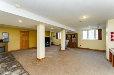 Ideally situated on a corner lot, this well-kept rambler offers on Dodge Country Club in Minnesota - for sale on GolfHomes.com, golf home, golf lot