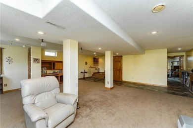 Ideally situated on a corner lot, this well-kept rambler offers on Dodge Country Club in Minnesota - for sale on GolfHomes.com, golf home, golf lot