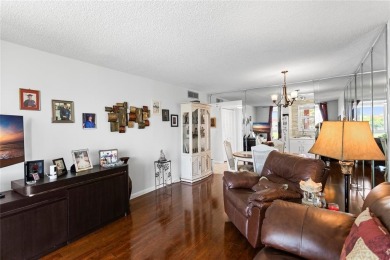 Bright and open 1/1 condo in Phase 3 of Sunrise Lakes community on Sunrise Lakes Phase III in Florida - for sale on GolfHomes.com, golf home, golf lot