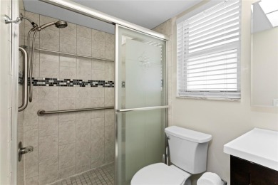 Bright and open 1/1 condo in Phase 3 of Sunrise Lakes community on Sunrise Lakes Phase III in Florida - for sale on GolfHomes.com, golf home, golf lot