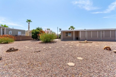 55+ buyers looking for a true move in ready home on an oversized on Apache Wells Country Club in Arizona - for sale on GolfHomes.com, golf home, golf lot