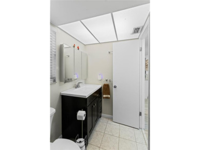 Bright and open 1/1 condo in Phase 3 of Sunrise Lakes community on Sunrise Lakes Phase III in Florida - for sale on GolfHomes.com, golf home, golf lot