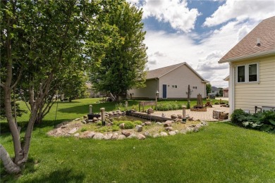 Ideally situated on a corner lot, this well-kept rambler offers on Dodge Country Club in Minnesota - for sale on GolfHomes.com, golf home, golf lot