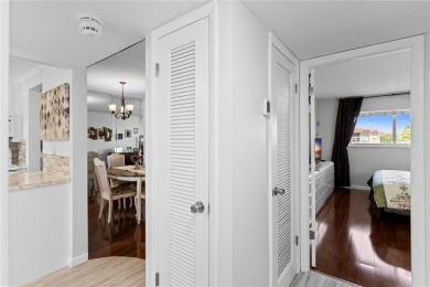 Bright and open 1/1 condo in Phase 3 of Sunrise Lakes community on Sunrise Lakes Phase III in Florida - for sale on GolfHomes.com, golf home, golf lot