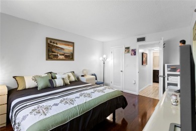 Bright and open 1/1 condo in Phase 3 of Sunrise Lakes community on Sunrise Lakes Phase III in Florida - for sale on GolfHomes.com, golf home, golf lot