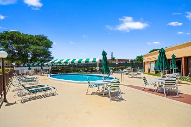 Bright and open 1/1 condo in Phase 3 of Sunrise Lakes community on Sunrise Lakes Phase III in Florida - for sale on GolfHomes.com, golf home, golf lot