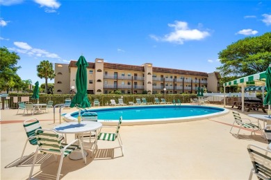 Bright and open 1/1 condo in Phase 3 of Sunrise Lakes community on Sunrise Lakes Phase III in Florida - for sale on GolfHomes.com, golf home, golf lot