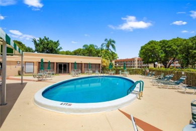 Bright and open 1/1 condo in Phase 3 of Sunrise Lakes community on Sunrise Lakes Phase III in Florida - for sale on GolfHomes.com, golf home, golf lot