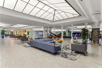 Bright and open 1/1 condo in Phase 3 of Sunrise Lakes community on Sunrise Lakes Phase III in Florida - for sale on GolfHomes.com, golf home, golf lot