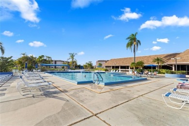 Bright and open 1/1 condo in Phase 3 of Sunrise Lakes community on Sunrise Lakes Phase III in Florida - for sale on GolfHomes.com, golf home, golf lot