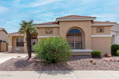 Presenting a beautifully maintained and expanded 2-bedroom plus on Arizona Traditions Golf Club in Arizona - for sale on GolfHomes.com, golf home, golf lot