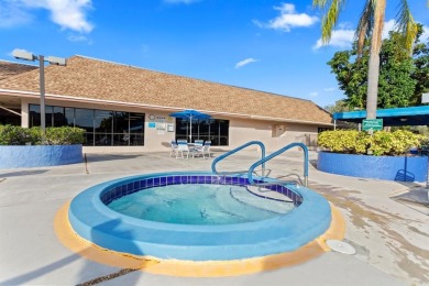 Bright and open 1/1 condo in Phase 3 of Sunrise Lakes community on Sunrise Lakes Phase III in Florida - for sale on GolfHomes.com, golf home, golf lot